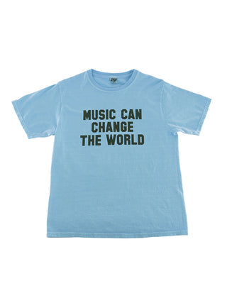 A light blue t-shirt with Music Can Change The World in dark green lettering.