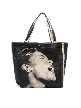 A canvas tote bag with a screenprint of Billie Holiday.