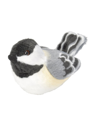 A plush stuffed animal of a black capped chickadee.