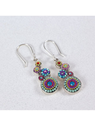 A pair of bejeweled dangle earrings made up of multiple stacked circles.