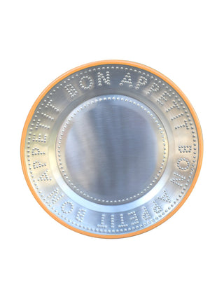 A steel plate with Bon Appetit embossed on the border, with an orange enamel trim.
