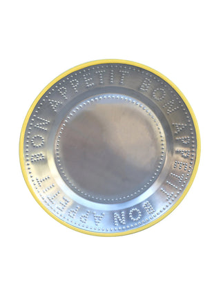 A steel plate with Bon Appetit embossed on the border, with a yellow enamel trim.