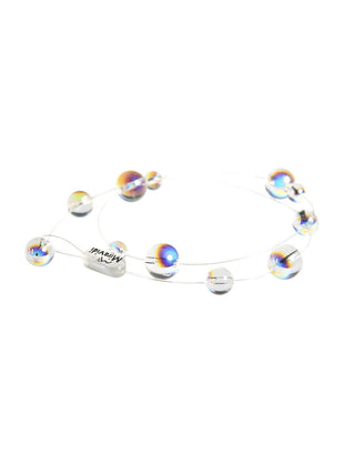 A bracelet with iridescent crystal pearls on nylon thread.