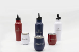 Red white and blue branded insulated tumblers in front of red white and blue branded water bottles.