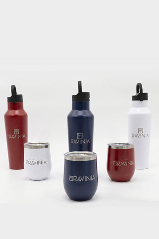 Red white and blue branded insulated tumblers in front of red white and blue branded water bottles.
