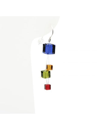 A wire earring with four multicolor crystal cubes on nylon thread, hanging from a display.