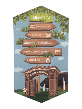 A hexagonal wooden magnet with the image of the Tyler Gate and a sign pointing to various venues at Ravinia.