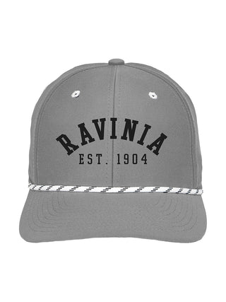 A gray basebcall cap with a white and black cord and the words Ravinia est. 1904 in black.