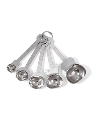 A set of 5 measuring spoons in the shape of various guitars, held together by an O-ring.