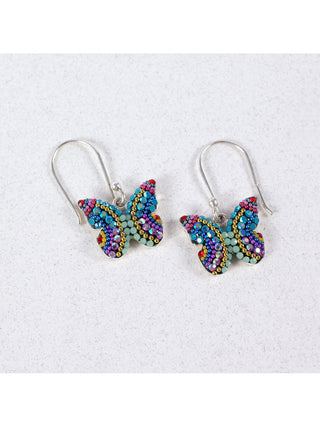 A pair of bedazzled crystal butterfly earrings on wire hooks.