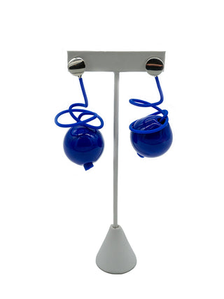Silver post earrings, with a hanging blue wire attached to a blue glass bead.