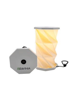 A white Ravinia branded hexagonal popup lantern, one closed one open.