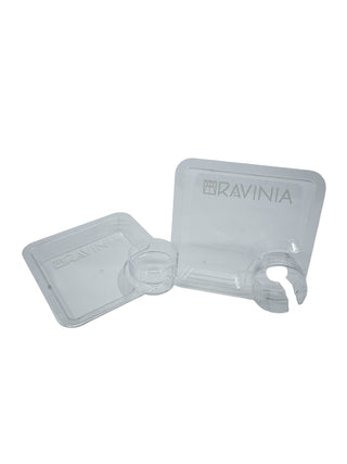 Two clear square acrylic plates with a drink holder.