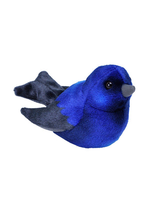 A plush version of a purple martin.