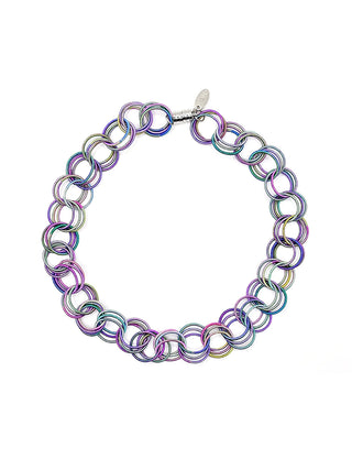 A rainbow necklace with a magnetic clasp made of loops of piano wire.