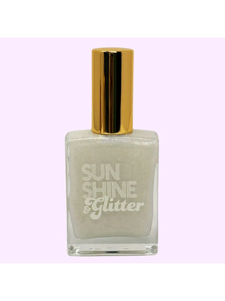 A clear bottle with silver shimmer oil, with a gold cap and the words Sunshine & Glitter.