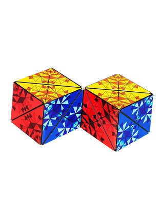 A puzzle cube with red, yellow, and blue sides, in the form of two connected cubes.