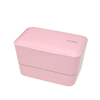 A candy pink two-tiered rectangular box with the word TAKENAKA on its right side.