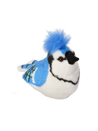 A stuffed toy in the shape of a blue jay, in blue, black and white.