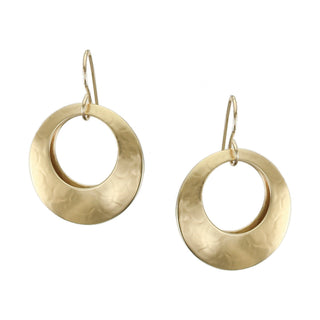 Two hand-hammered brass discs hanging from wires.