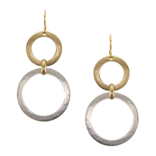 Wire earrings with a brass hoop and a larger silver-toned hoop beneath.