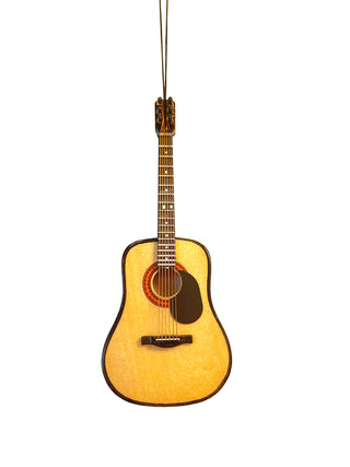 An ornament that looks exactly like a brown acoustic guitar, with a cord for hanging
