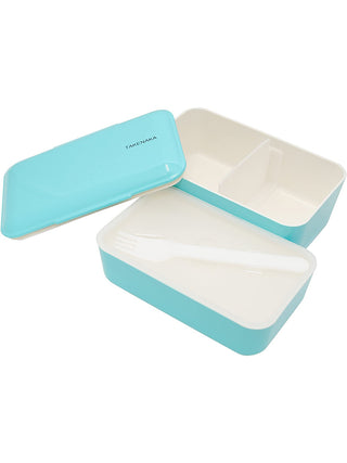 An ice blue rectangular box, open, with the lid on the left and the two white interior sections on the right. The section at the top has a spacer in the middle, and the one at the bottom has a white plastic fork in it.