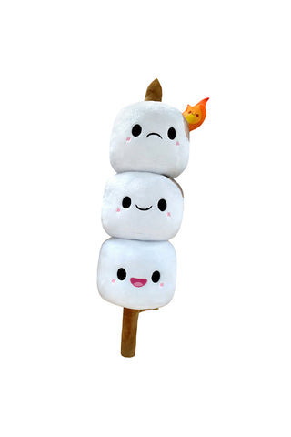 A stick with three plush marshmallows with faces, on a stick, the top one frowning at a flame begins to burn him.