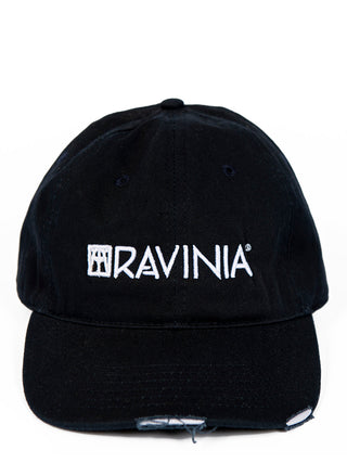 Navy blue baseball cap with some wear on its bill, and the Ravinia logo and wording in white above.