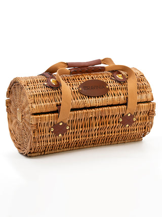 A closed cylindrical basket with an oval that says Ravinia on the front, and two carrying handles.